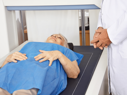 a senior woman having a bone density test done